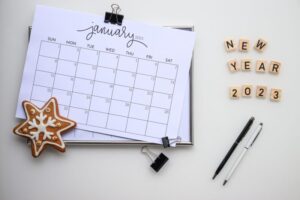 Calendar flat lay. New year 2023. Background.