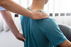 Physical therapists are working for man patients at the clinic.