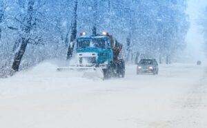 snow plow doing snow