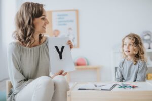 Speech therapist and boy