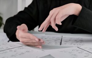 hands of a teenager show a word in sign language in front of learning skill