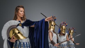 Combative greek soldiers with spears against grey background