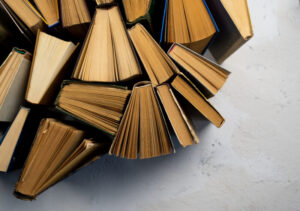 Book background. Old books in the library. Bookshelf shop. Knowledge, publications, literature