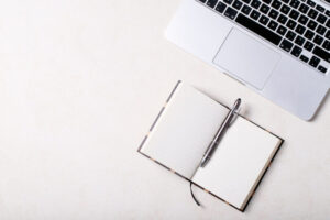 Working place with notepad and pen