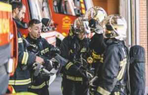 Firemen working at fire station.