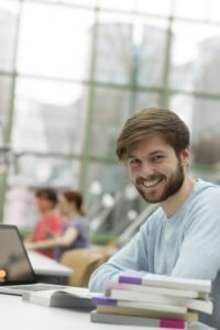 Portrait of student learning in a university library