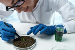 female laboratory assistant biology research plants biology