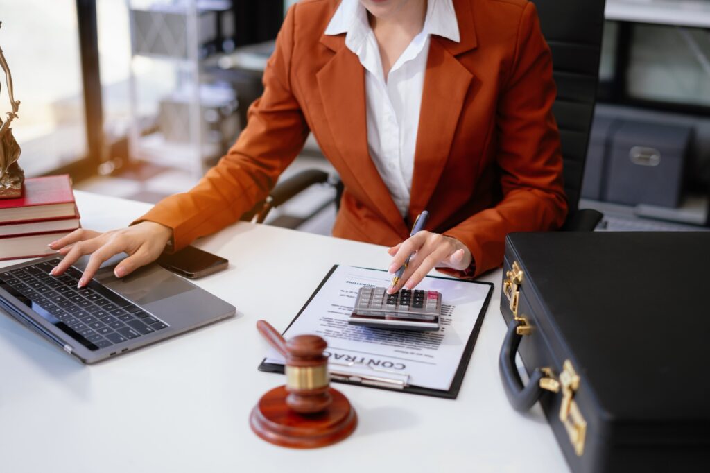 Justice and law concept. Female judge in a courtroom the gavel