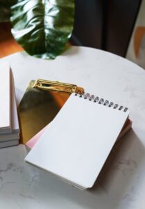 Notepad on a marble texture table